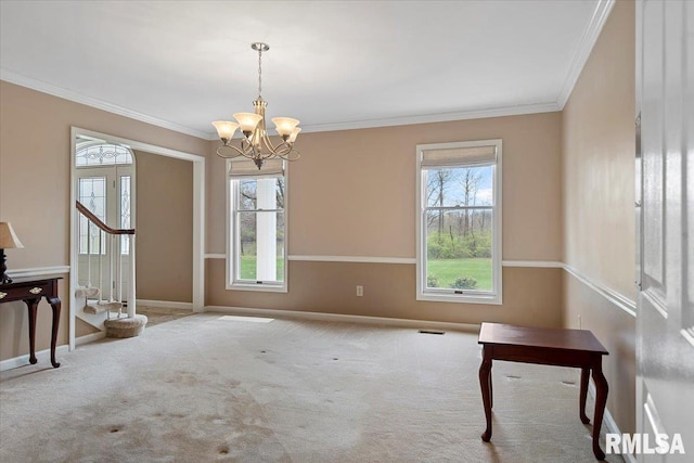unfurnished dining area featuring a notable chandelier, visible vents, crown molding, and a healthy amount of sunlight
