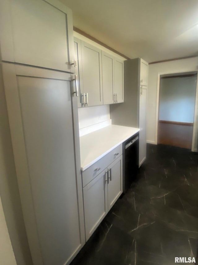 kitchen featuring gray cabinets, light countertops, and dishwasher