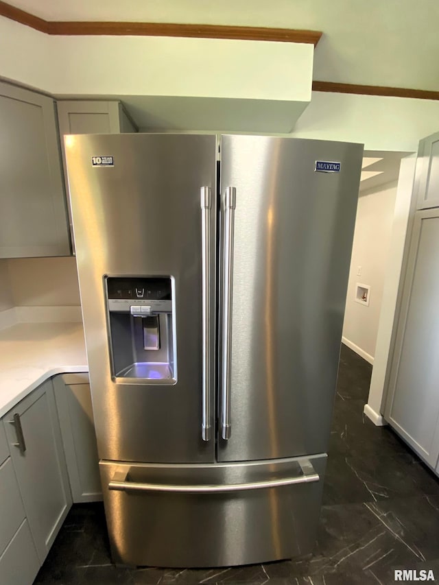 details featuring high quality fridge and gray cabinets