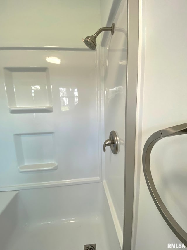 full bath featuring walk in shower