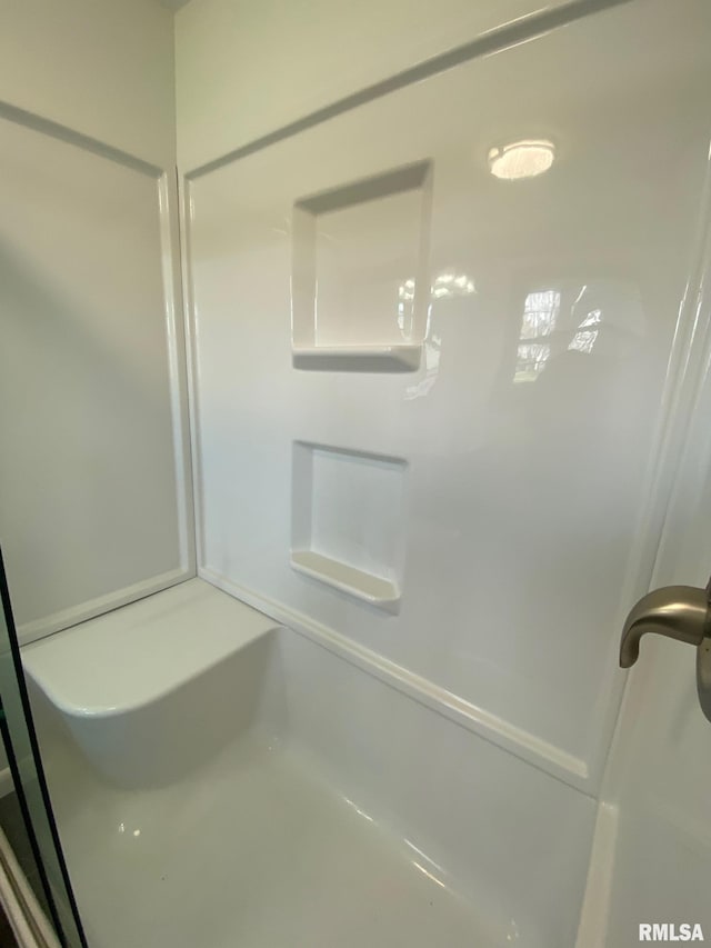 bathroom featuring walk in shower