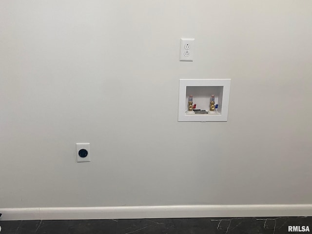laundry room featuring laundry area, hookup for an electric dryer, washer hookup, and baseboards