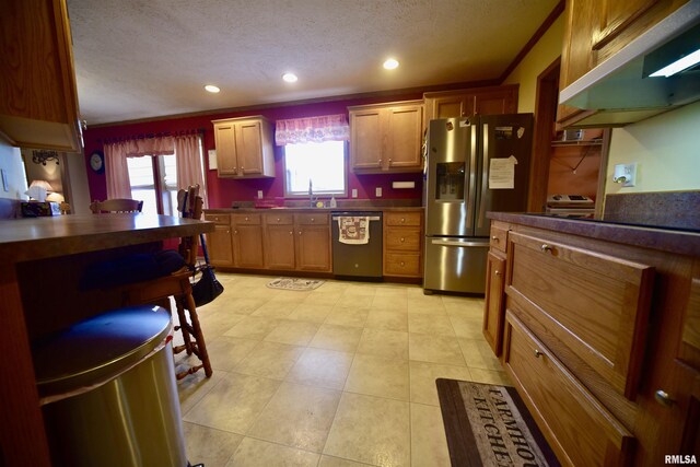 24 Davis Rd, Cave In Rock, IL 62919 - kitchen with a sink, appliances with stainless steel finishes, under cabinet range hood, and a textured ceiling