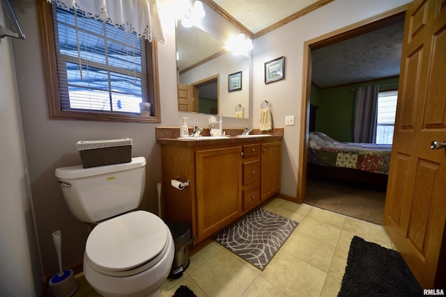 24 Davis Rd, Cave In Rock, IL 62919 - ensuite bathroom featuring ensuite bathroom, ornamental molding, toilet, a textured ceiling, and tile patterned floors