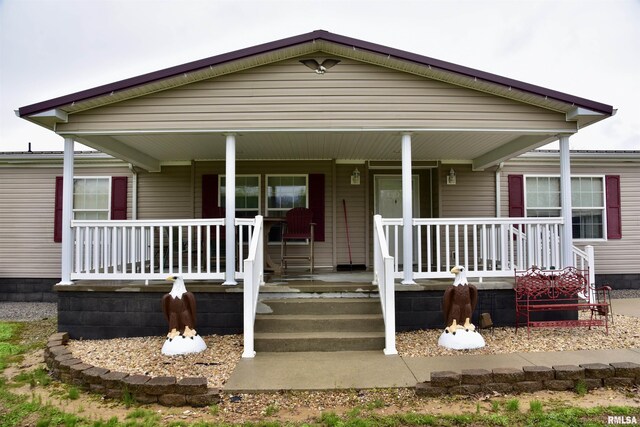24 Davis Rd, Cave In Rock, IL 62919 - view of front facade featuring covered porch