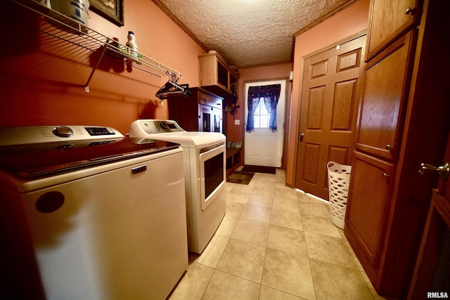24 Davis Rd, Cave In Rock, IL 62919 - laundry area with independent washer and dryer, laundry area, a textured ceiling, and light tile patterned flooring