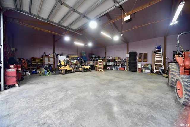 24 Davis Rd, Cave In Rock, IL 62919 - garage featuring a workshop area and a garage door opener