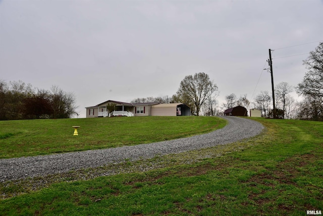 24 Davis Rd, Cave In Rock, IL 62919 - exterior space with gravel driveway