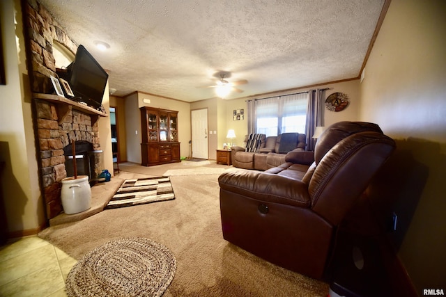 24 Davis Rd, Cave In Rock, IL 62919 - living area with crown molding, ceiling fan, a fireplace, light colored carpet, and baseboards