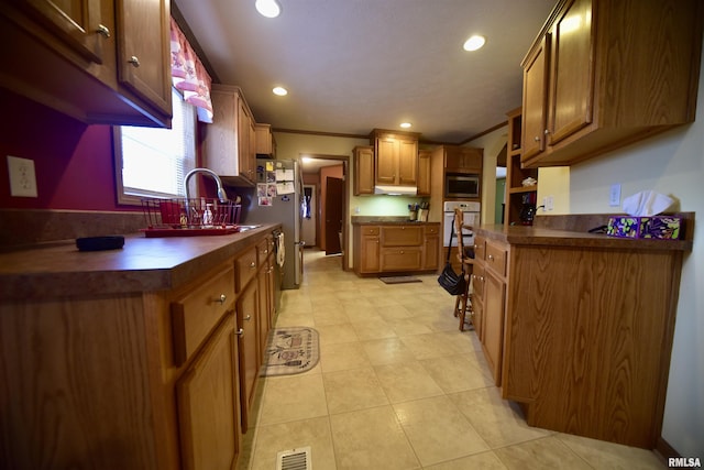 24 Davis Rd, Cave In Rock, IL 62919 - kitchen featuring white oven, a sink, dark countertops, stainless steel microwave, and recessed lighting