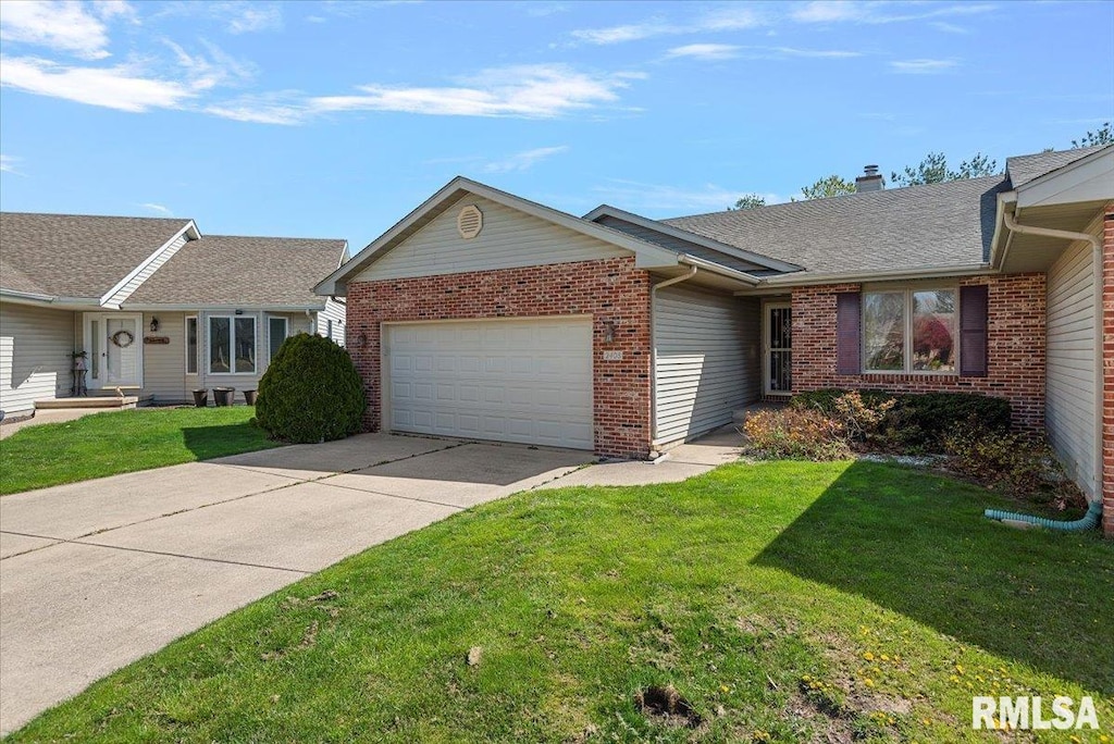2408 Flaxen Mill Ct, Springfield, IL 62704 - single story home featuring a shingled roof, concrete driveway, brick siding, a front yard, and a garage