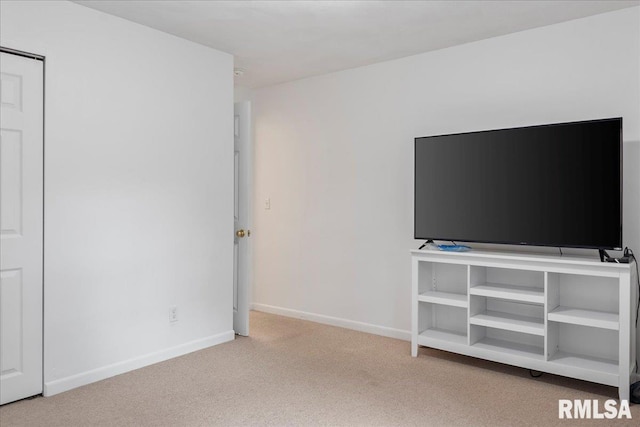 unfurnished bedroom with baseboards and carpet floors