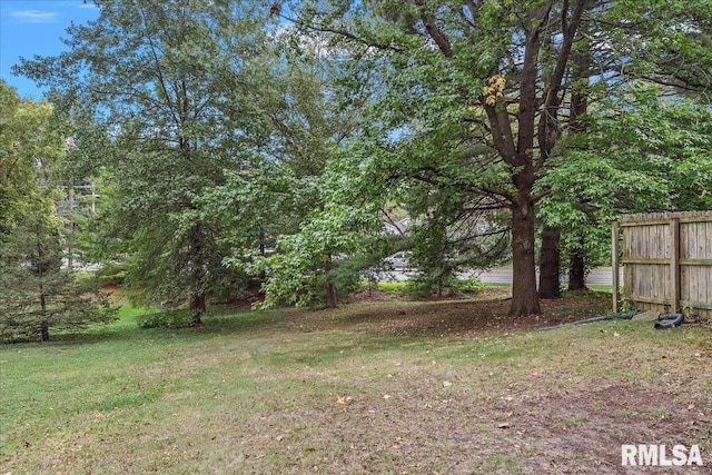 view of yard with fence