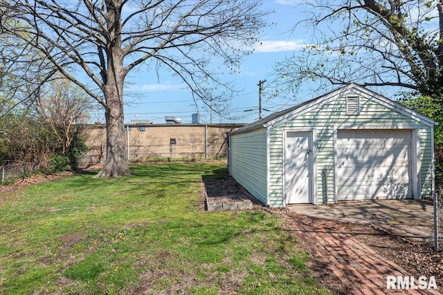 detached garage with fence