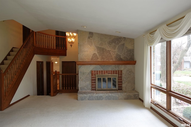 50 Hackberry Cir, Galesburg, IL 61401 - unfurnished living room featuring a chandelier, carpet, stairway, lofted ceiling, and a glass covered fireplace