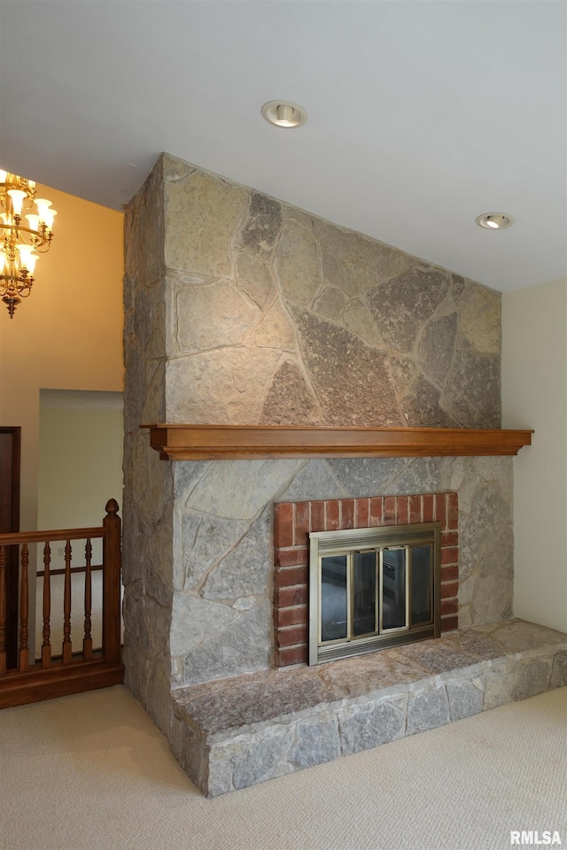 50 Hackberry Cir, Galesburg, IL 61401 - detailed view of a fireplace, carpet floors, a chandelier, and recessed lighting