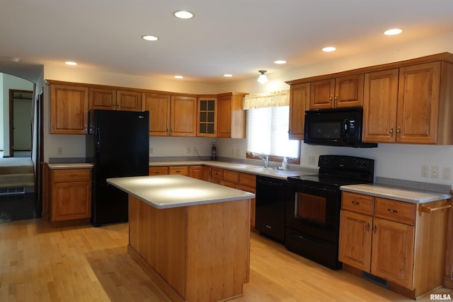 50 Hackberry Cir, Galesburg, IL 61401 - kitchen featuring black appliances, brown cabinets, light countertops, and recessed lighting