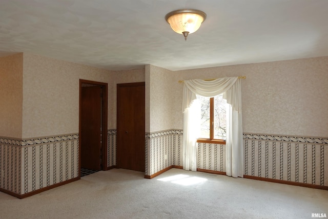 50 Hackberry Cir, Galesburg, IL 61401 - empty room featuring wallpapered walls and carpet floors