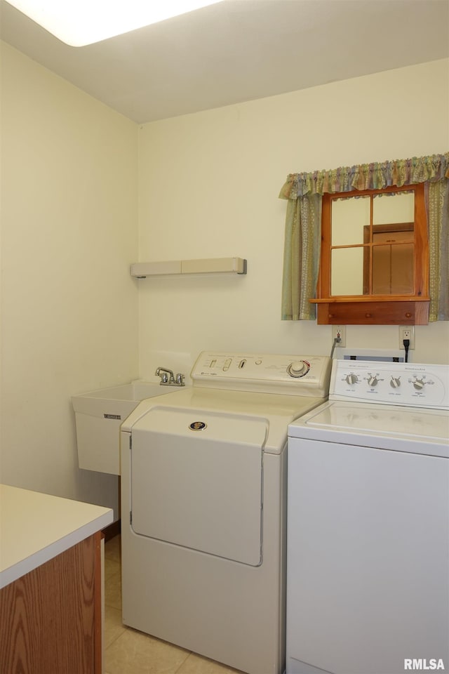 50 Hackberry Cir, Galesburg, IL 61401 - washroom featuring independent washer and dryer and light tile patterned floors
