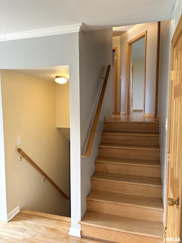 2110 Magnolia Dr, Jacksonville, IL 62650 - staircase featuring wood finished floors