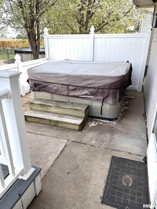 2110 Magnolia Dr, Jacksonville, IL 62650 - wooden deck featuring fence and a hot tub
