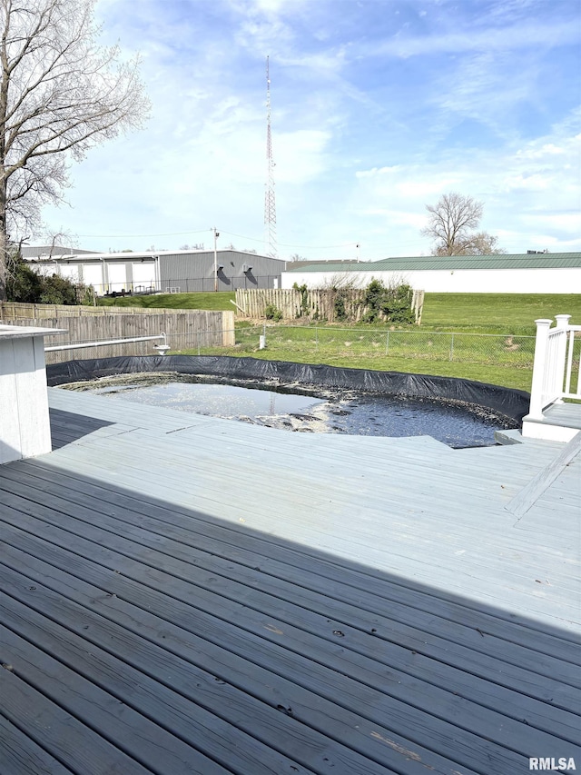 2110 Magnolia Dr, Jacksonville, IL 62650 - wooden deck with a yard and fence