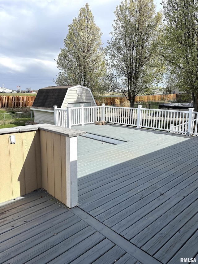 2110 Magnolia Dr, Jacksonville, IL 62650 - wooden deck with a storage shed, an outdoor structure, and fence
