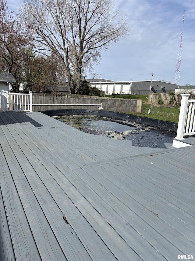 2110 Magnolia Dr, Jacksonville, IL 62650 - deck featuring a fenced backyard