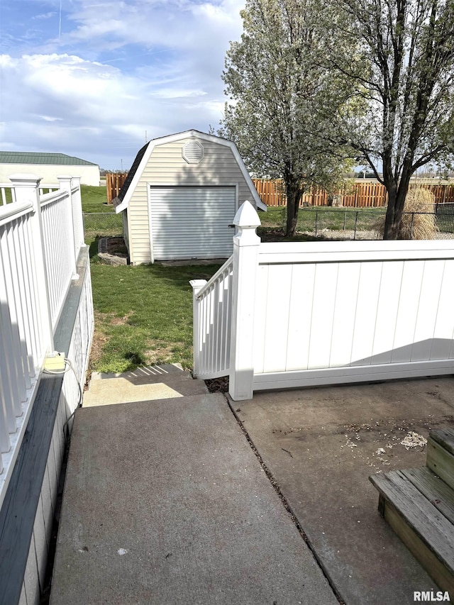 2110 Magnolia Dr, Jacksonville, IL 62650 - view of patio / terrace featuring fence private yard and an outdoor structure