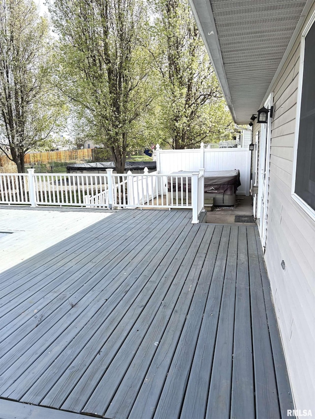 2110 Magnolia Dr, Jacksonville, IL 62650 - wooden deck featuring a fenced backyard and a hot tub