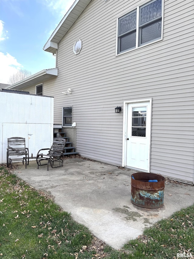 2110 Magnolia Dr, Jacksonville, IL 62650 - rear view of property featuring a patio
