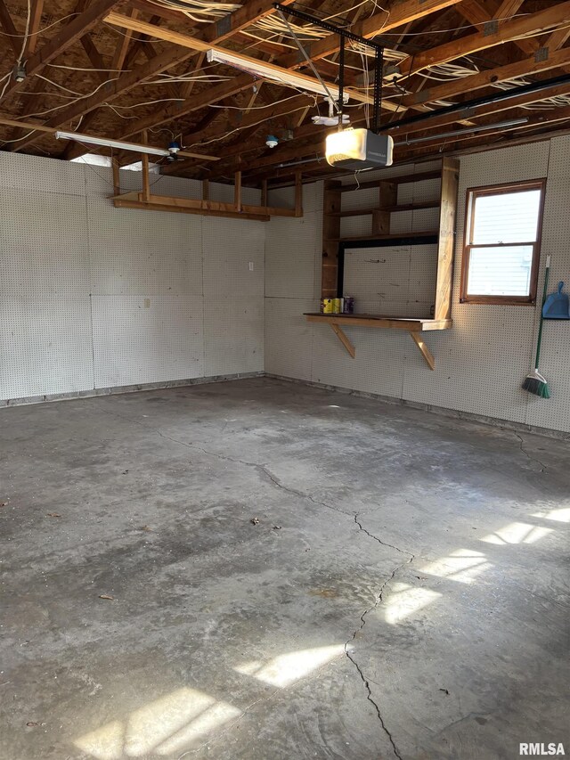 2110 Magnolia Dr, Jacksonville, IL 62650 - garage with a garage door opener