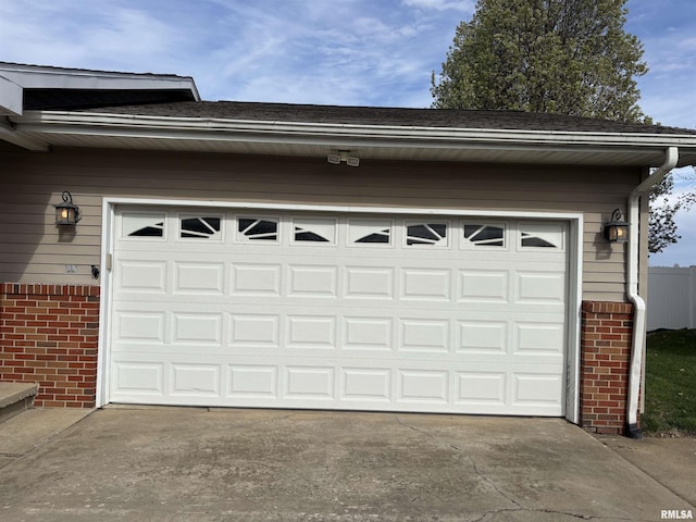 2110 Magnolia Dr, Jacksonville, IL 62650 - garage with driveway