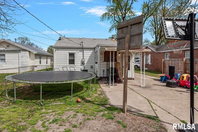 417 N Stephens Ave, Springfield, IL 62702 - back of house with a trampoline and a patio