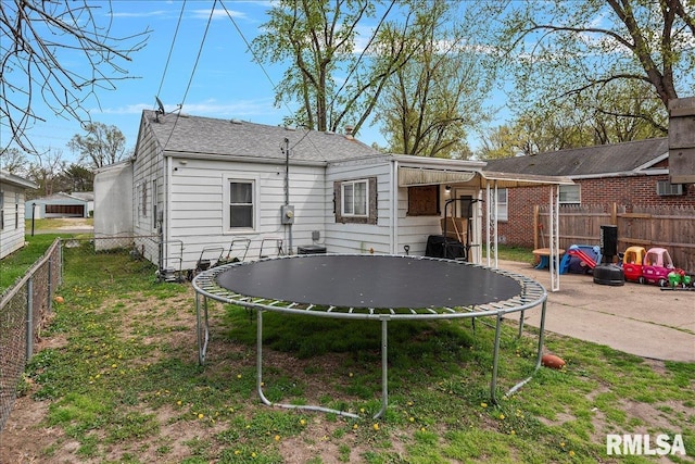 417 N Stephens Ave, Springfield, IL 62702 - back of property featuring a trampoline