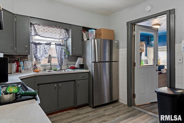 417 N Stephens Ave, Springfield, IL 62702 - kitchen with freestanding refrigerator, a sink, light countertops, and gray cabinets