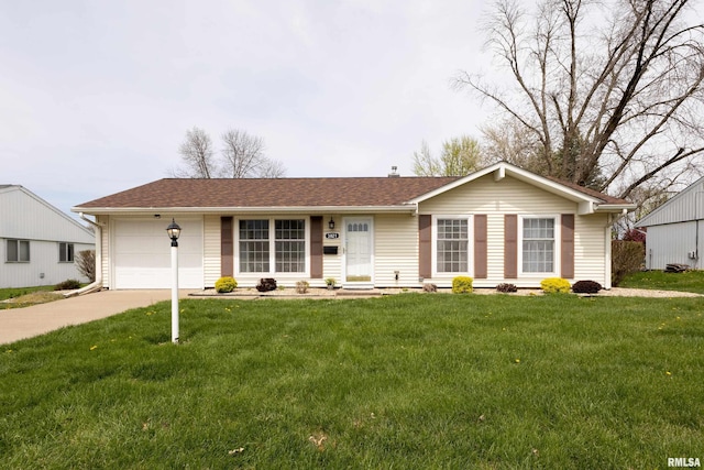 ranch-style home featuring a front yard, a garage, and concrete driveway