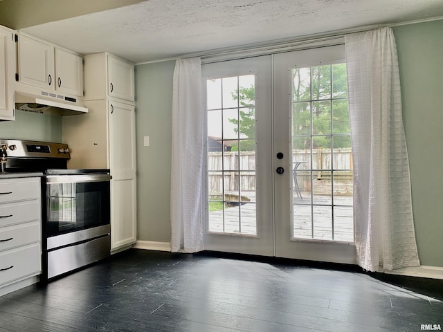 entryway with dark wood finished floors, baseboards, and french doors