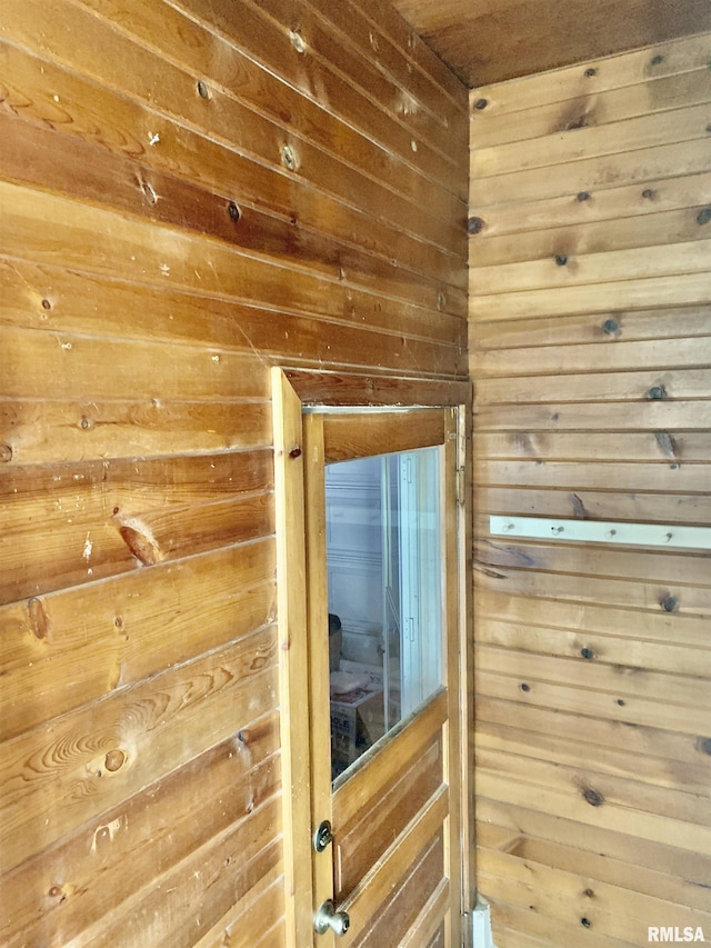 room details featuring wooden walls