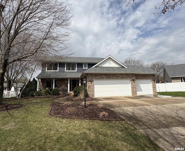 3096 Whitehaven Cir, Galesburg, IL 61401 - traditional-style home with fence, a shingled roof, concrete driveway, an attached garage, and a front yard