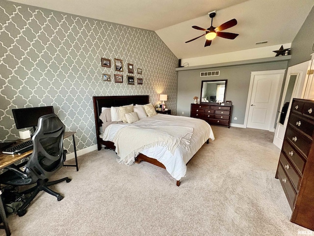 3096 Whitehaven Cir, Galesburg, IL 61401 - carpeted bedroom with lofted ceiling, baseboards, visible vents, and ceiling fan