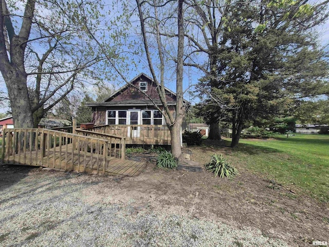 view of front of house with a wooden deck