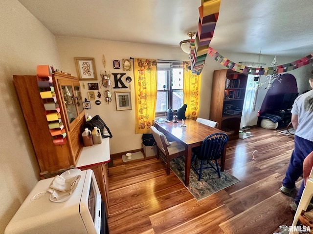 1038 W Maple Ave, Springfield, IL 62704 - dining room with wood finished floors and baseboards