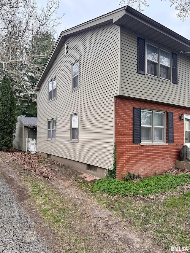 1038 W Maple Ave, Springfield, IL 62704 - view of home's exterior with brick siding