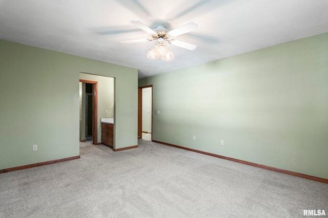 unfurnished bedroom with light carpet, baseboards, and ceiling fan