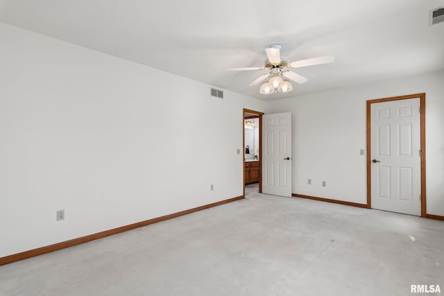 spare room featuring visible vents, baseboards, ceiling fan, and light colored carpet