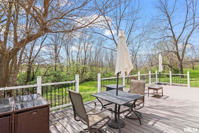 deck featuring outdoor dining space