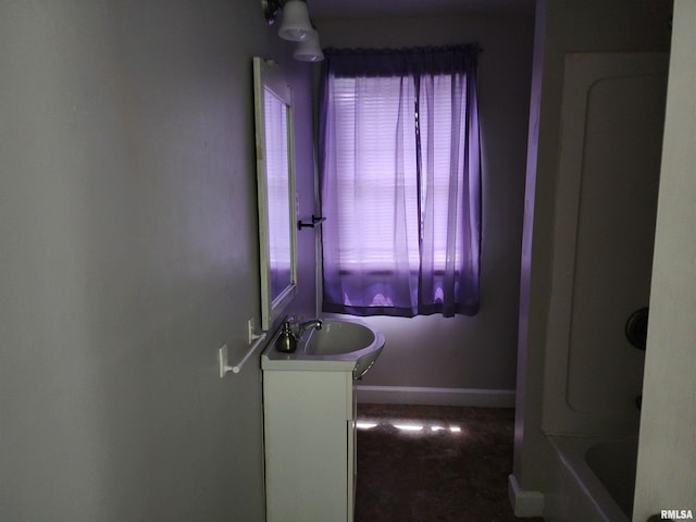 403 S Elm St, Lincoln, IL 62656 - bathroom with vanity and shower / bathtub combination