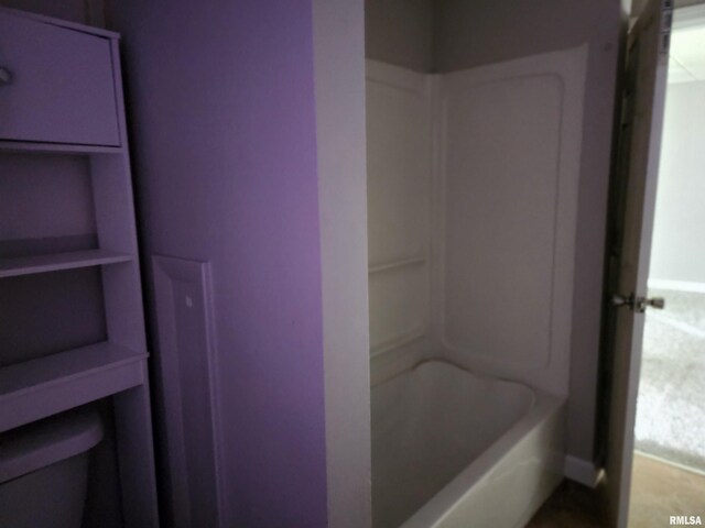 403 S Elm St, Lincoln, IL 62656 - bathroom with toilet and shower / tub combination