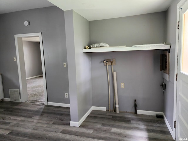 403 S Elm St, Lincoln, IL 62656 - laundry room featuring wood finished floors and baseboards